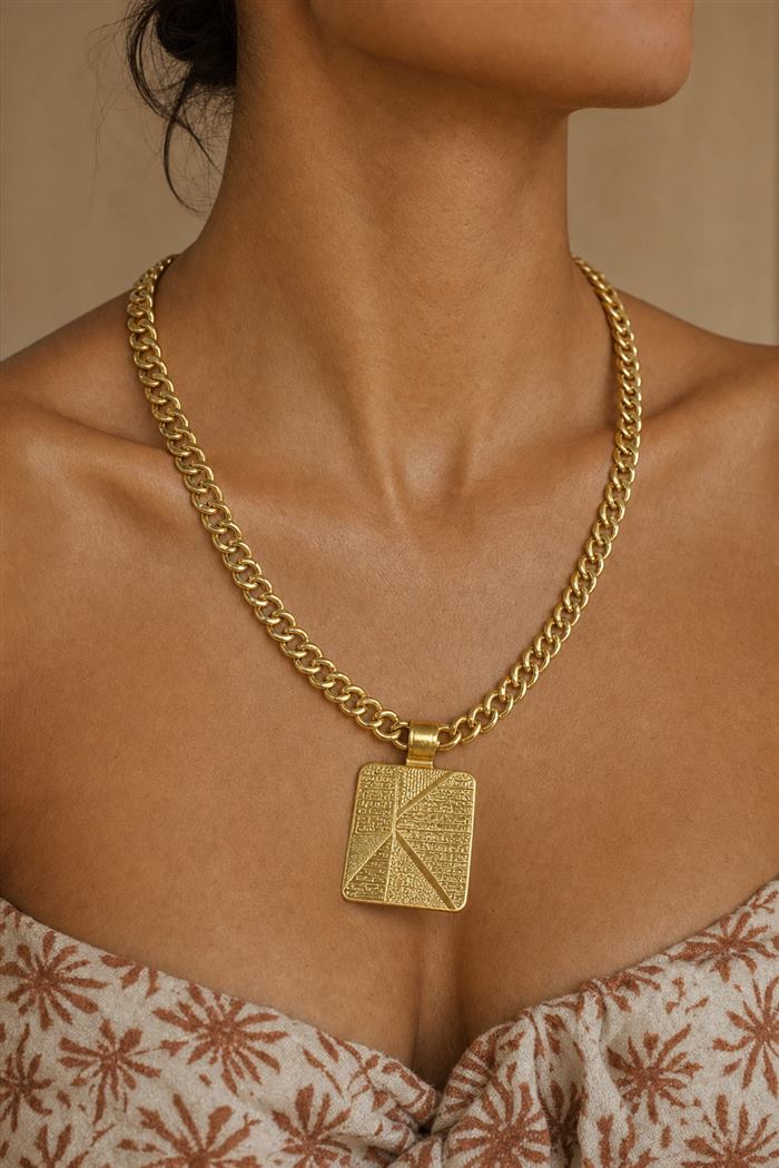 Studio result: the necklace worn, cropped at the collarbone
